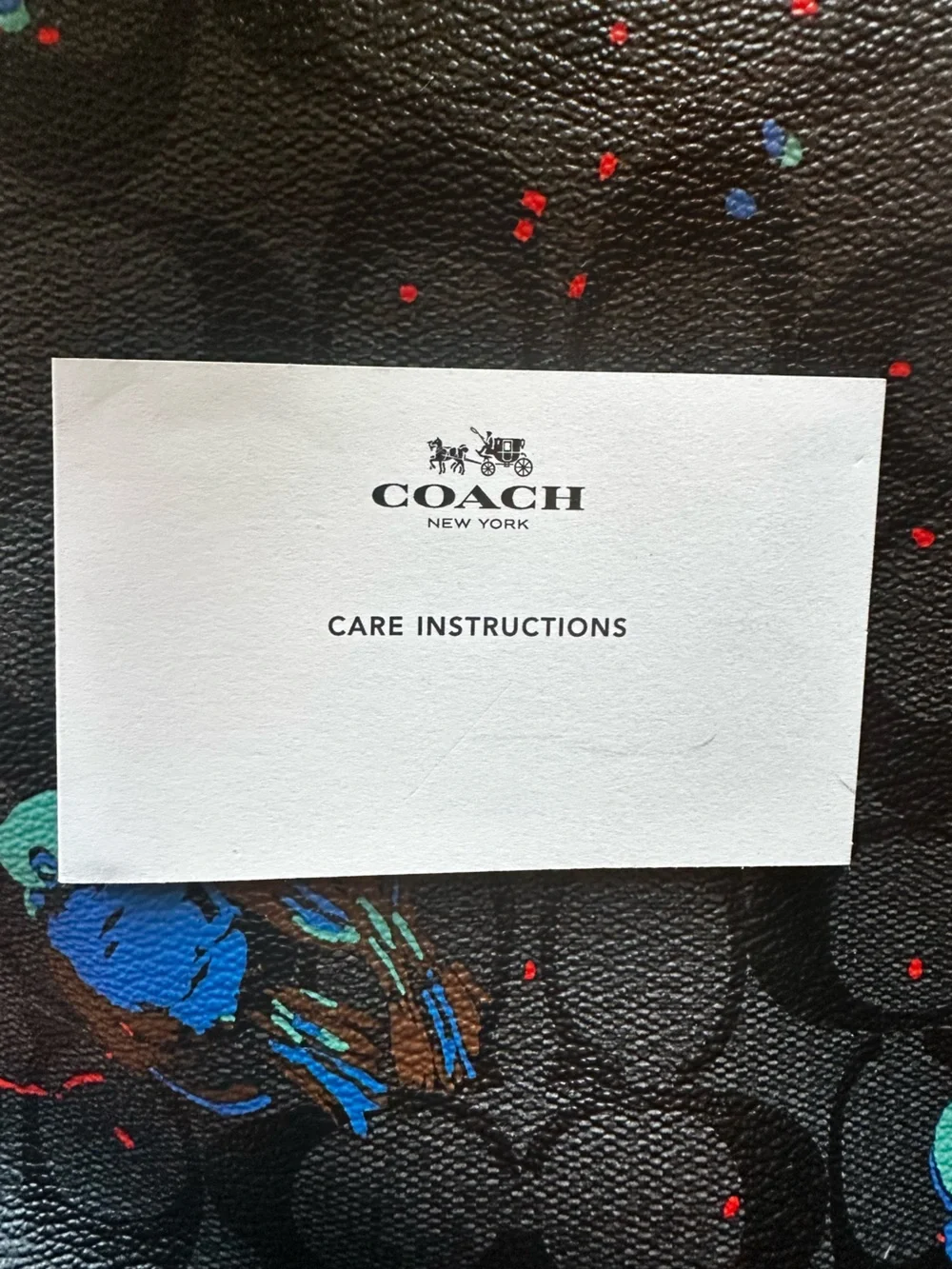 Authentic Coach Black Signature Tote with Blue Accent Floral Print